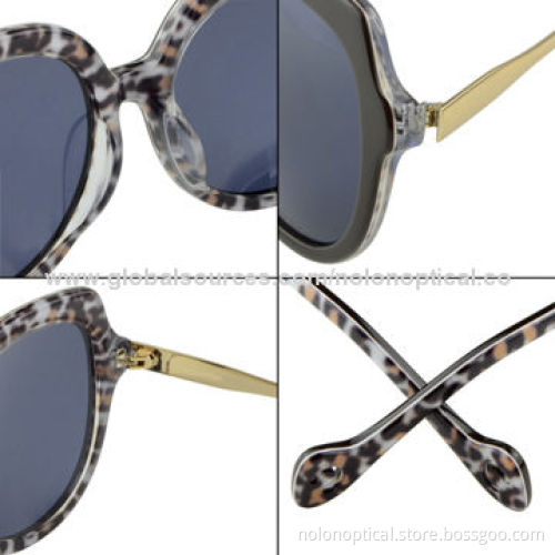 Oversize black tortoise sunglasses temple with hole deco